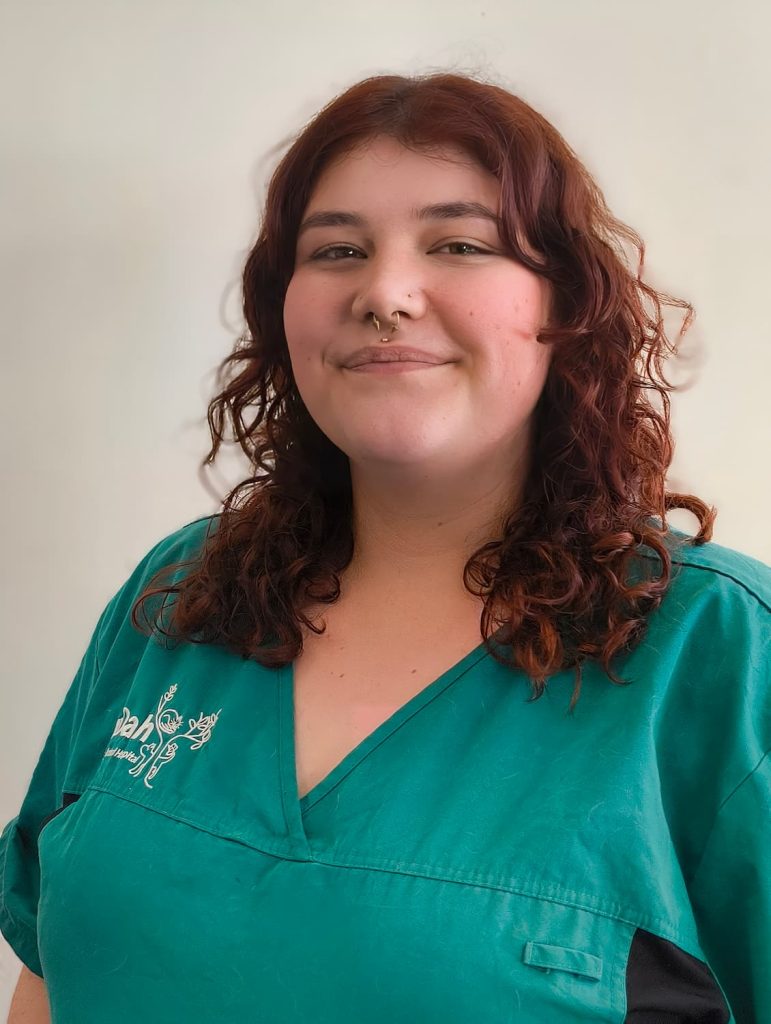 Lydia Forster in NOAH uniform smiling